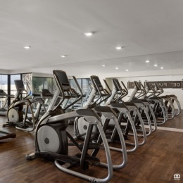 et your sweat on at Sherman Circle with not one, not two, but three amazing fitness zones! Equip yourself with cardio and strength equipment for a workout like no other. fitness center with exercise equipment
