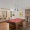 game room with a pool table and a table and chairs