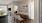 a dining room with a table and chairs