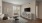 a living room with a tv and couches