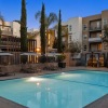 pool with reclining seats and modern stonework